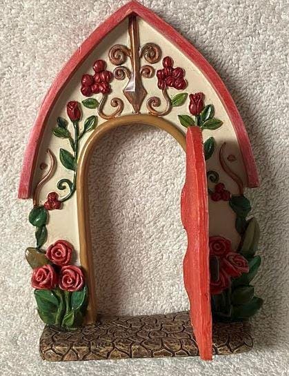 Red Door in Floral Decorated Arched Entry Way, Fairy Garden Door