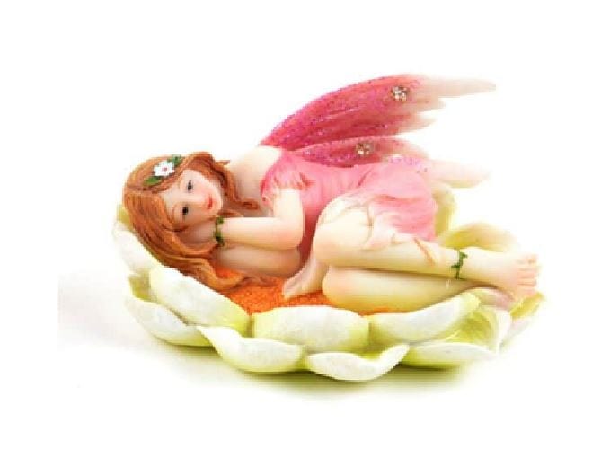 Fairy in Pink Resting on a Flower