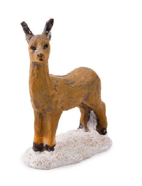 Miniature Reindeer in the Snow