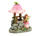 Fairy in Pink by a Wishing Well