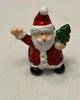 Miniature  Santa Figurine Holding Christmas Tree